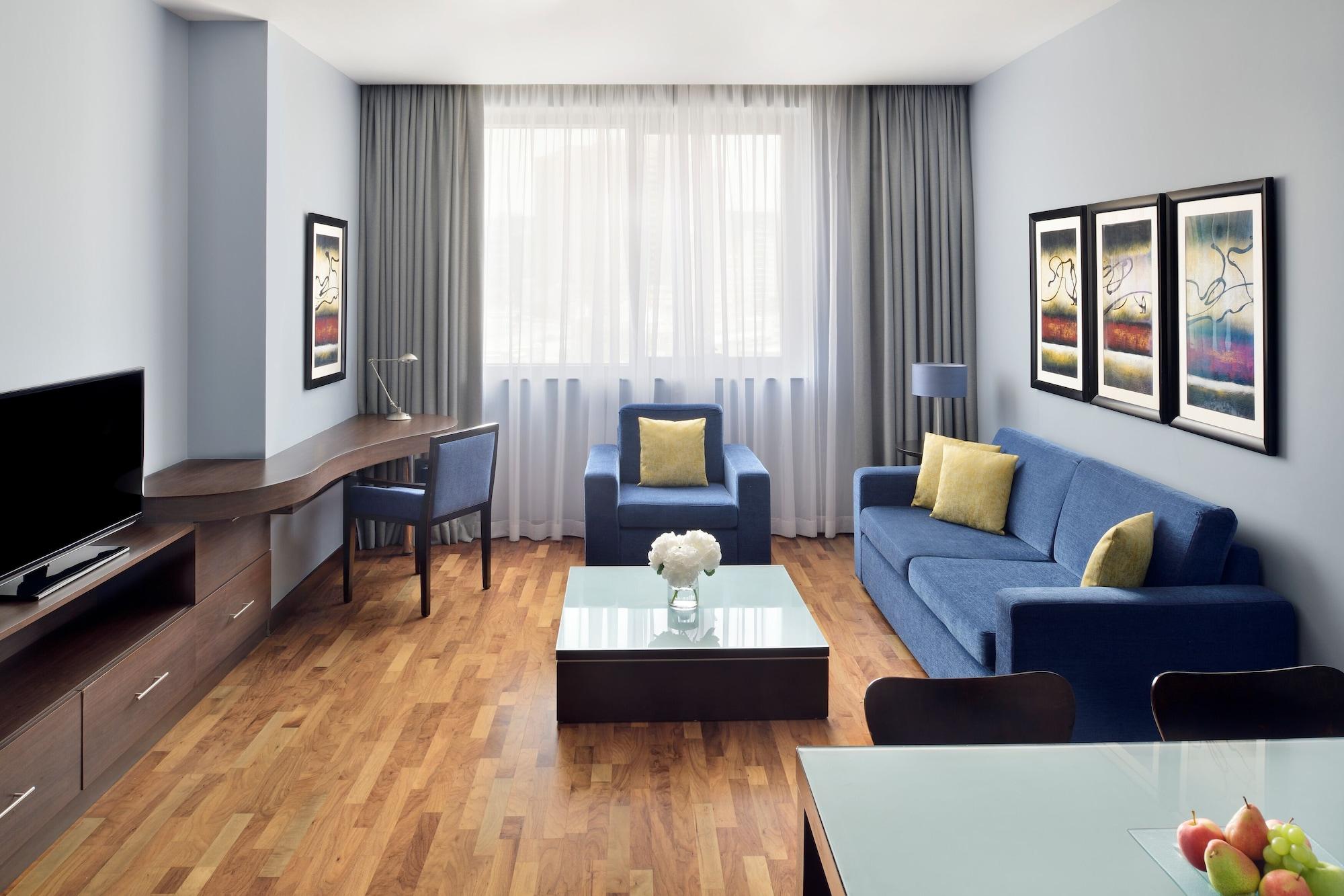 뫼벤픽 호텔 아파트먼트 알 맘자르 두바이 외부 사진 A typical living room