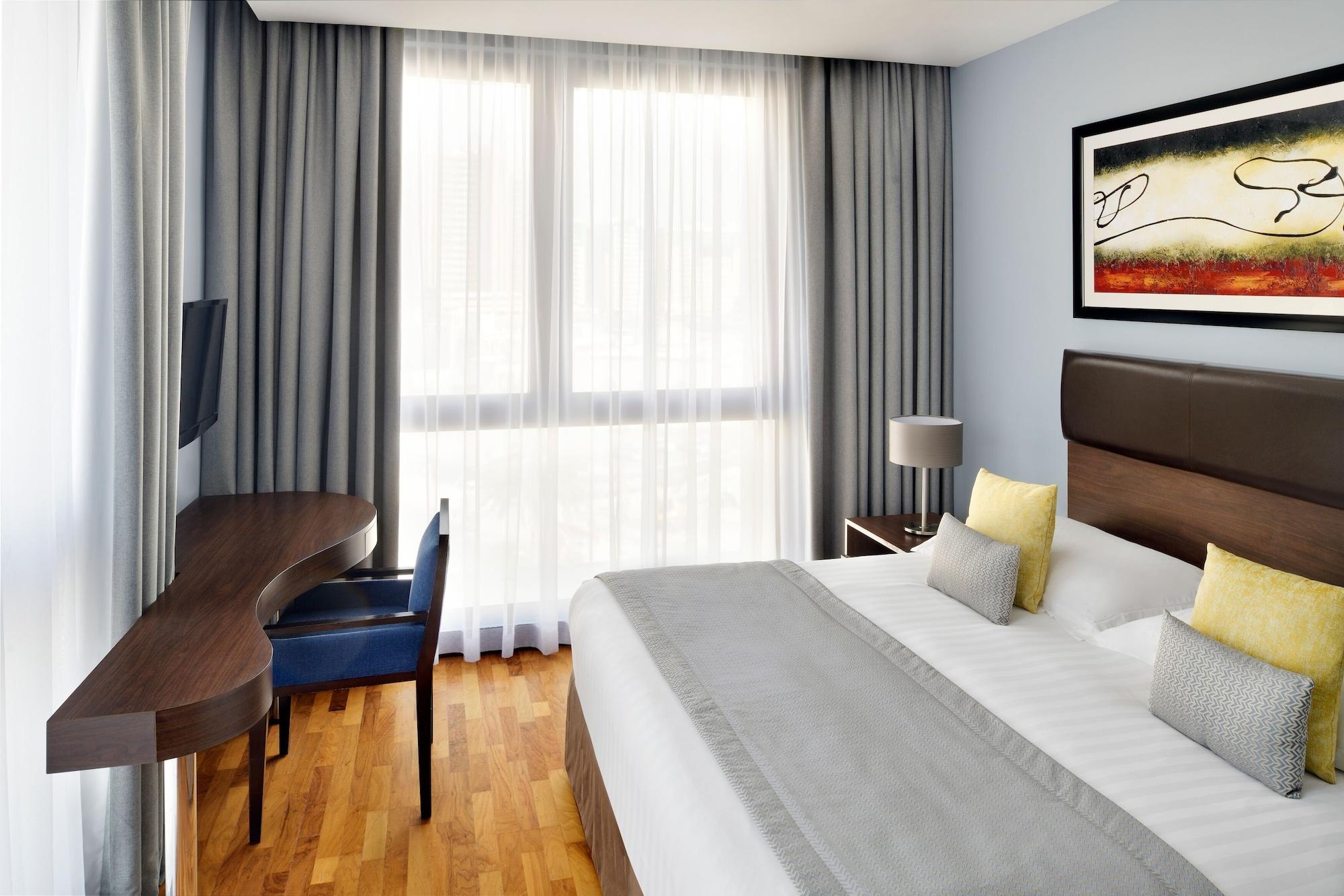 뫼벤픽 호텔 아파트먼트 알 맘자르 두바이 외부 사진 A typical room at the hotel