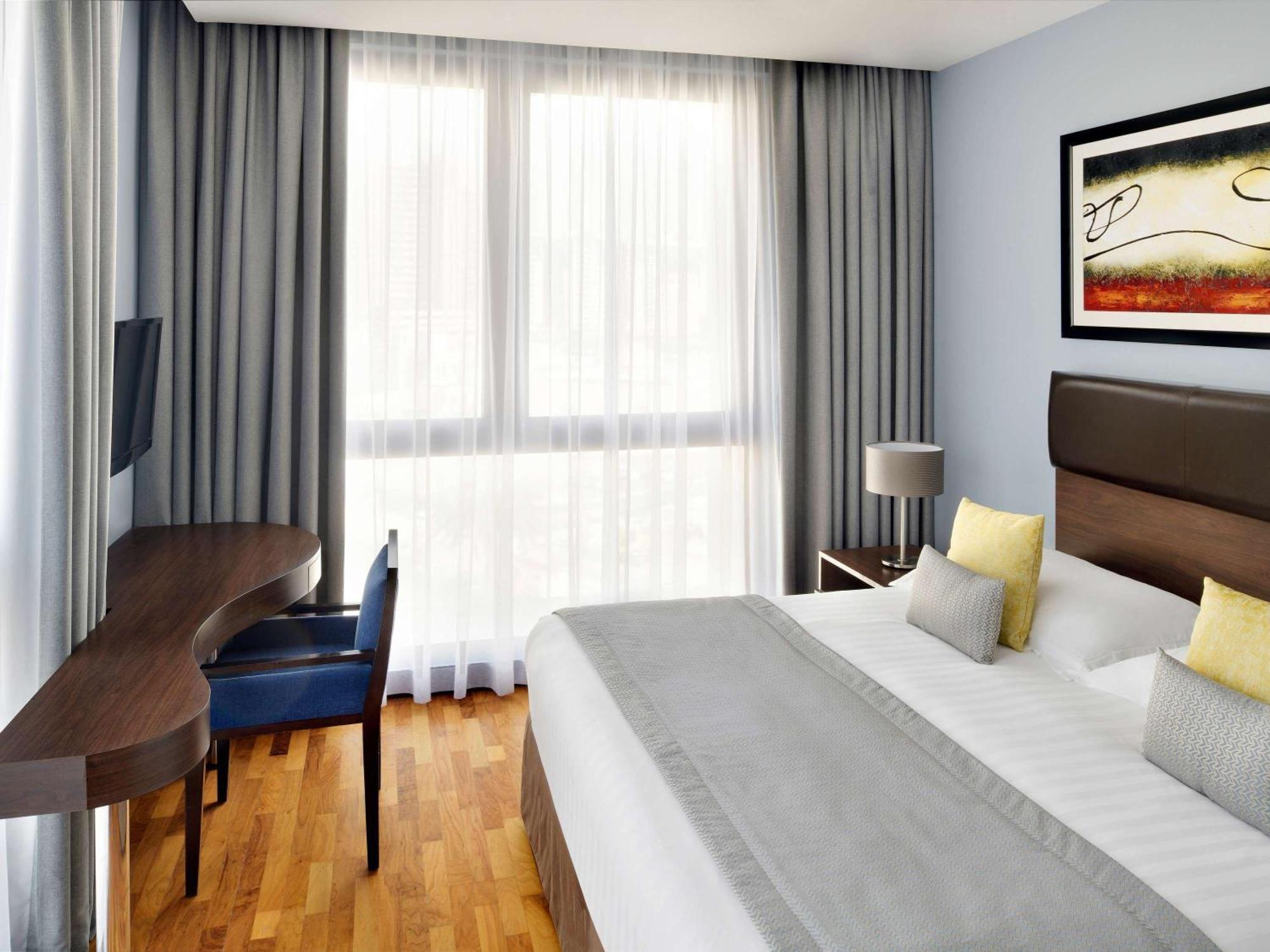 뫼벤픽 호텔 아파트먼트 알 맘자르 두바이 외부 사진 A typical room at the hotel