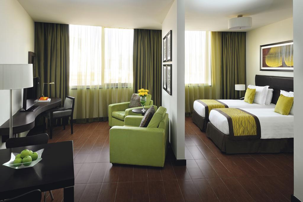 뫼벤픽 호텔 아파트먼트 알 맘자르 두바이 외부 사진 A typical room at the hotel